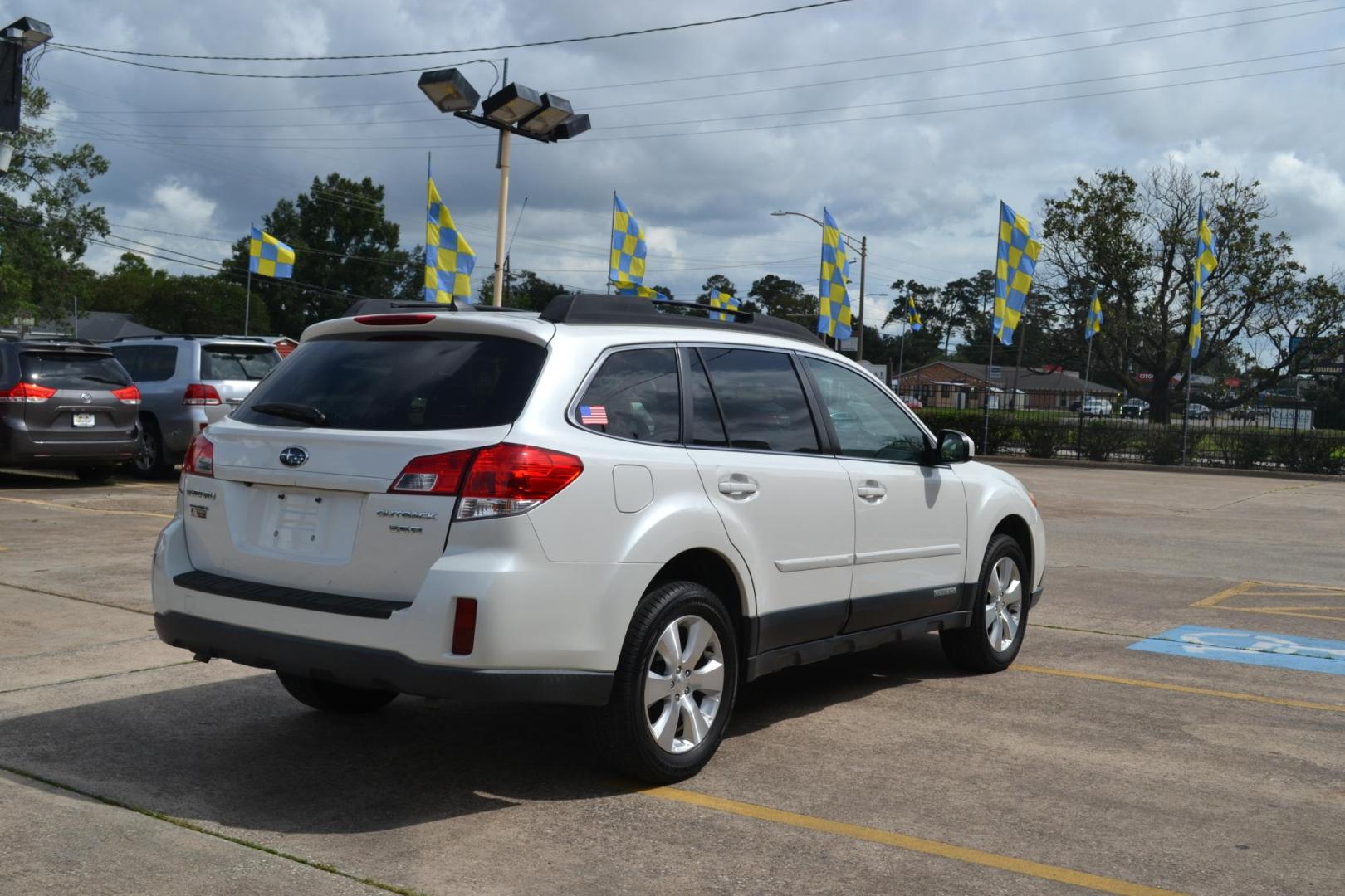 2011 Satin White Pearl /Warm Ivory Leather Interior Subaru Outback 3.6R Limited (4S4BREKC2B2) with an 3.6L H6 DOHC 24V engine, 5-Speed Automatic transmission, located at 1355 North 11th Street, Beaumont, 77702, (409) 832-0006, 30.094290, -94.130096 - Photo#4